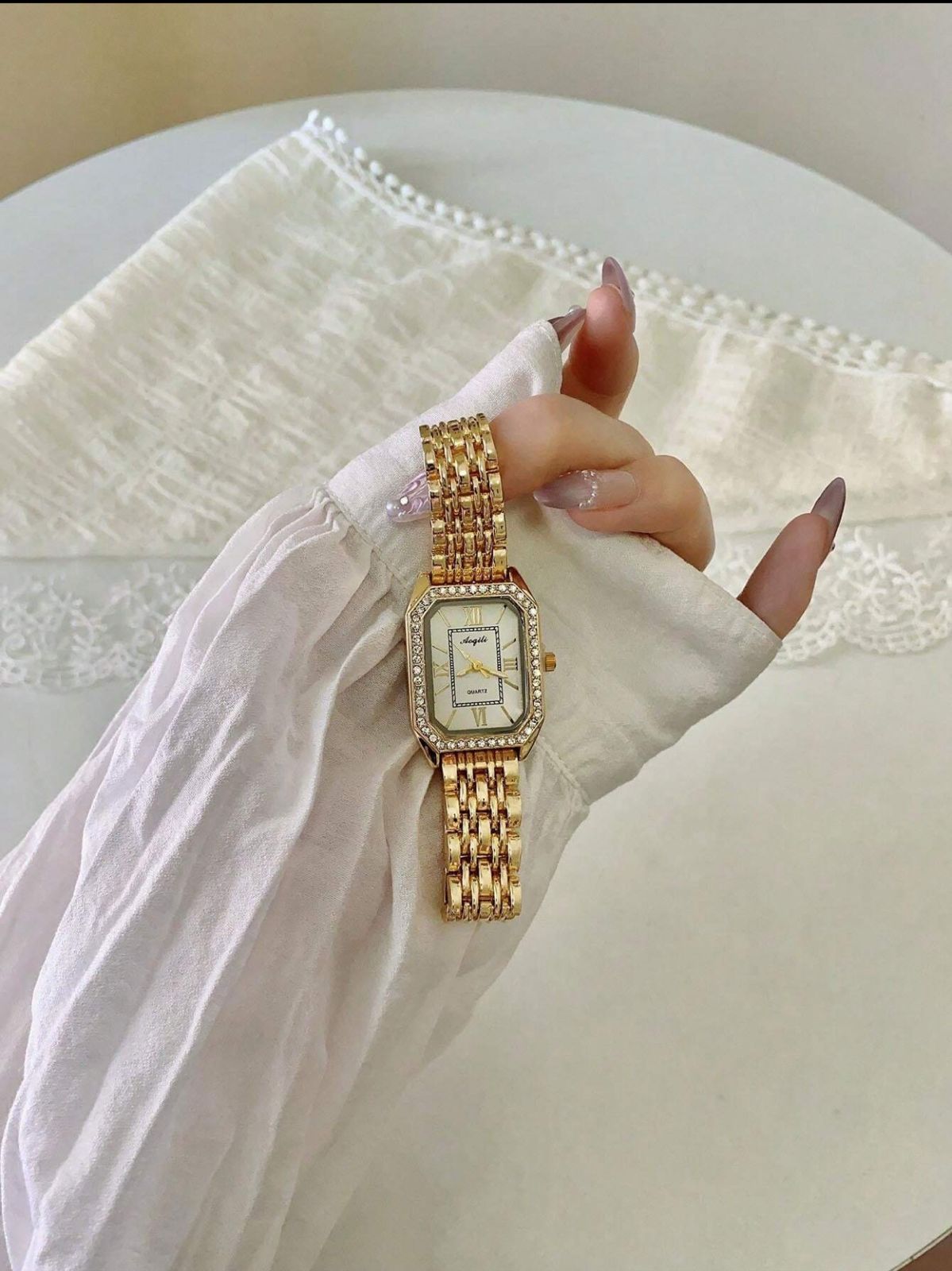 Golden Roman Numeral Dial Watch